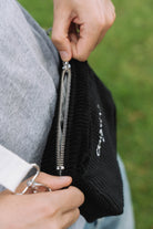 Black corduroy crossbody bag, zip closure detail