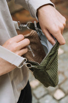 Khaki corduroy crossbody bag, detachable strap clasp detail